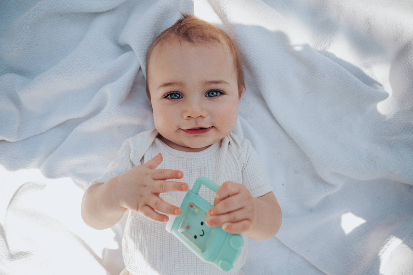 Itzy Ritzy - Sweetie Shake Plus™ - Teething + Rattle Toy: Tumbler