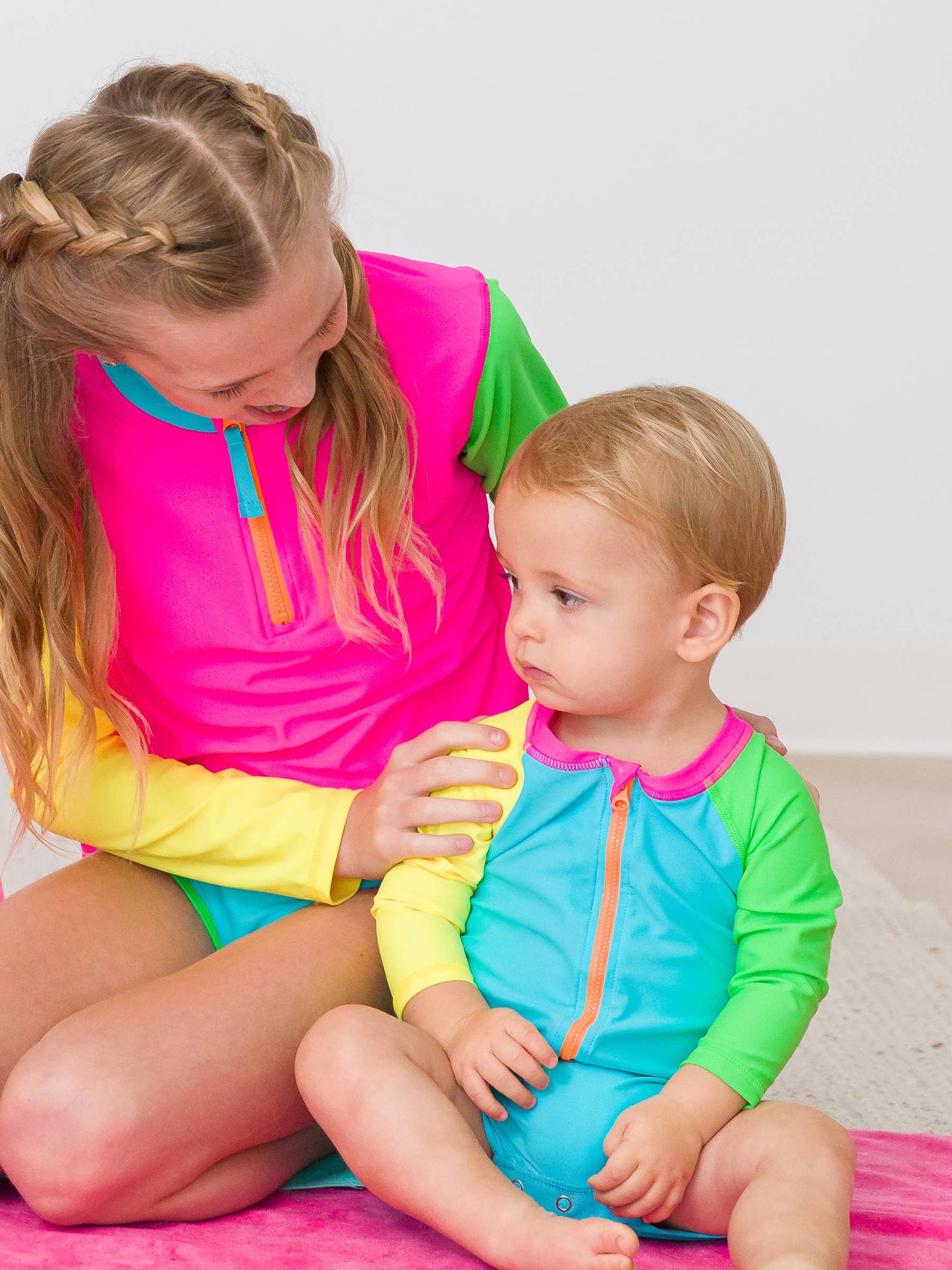 RuffleButts + RuggedButts - Baby Boys Neon Color Block Long Sleeve One Piece Rash Guard Swimsuit