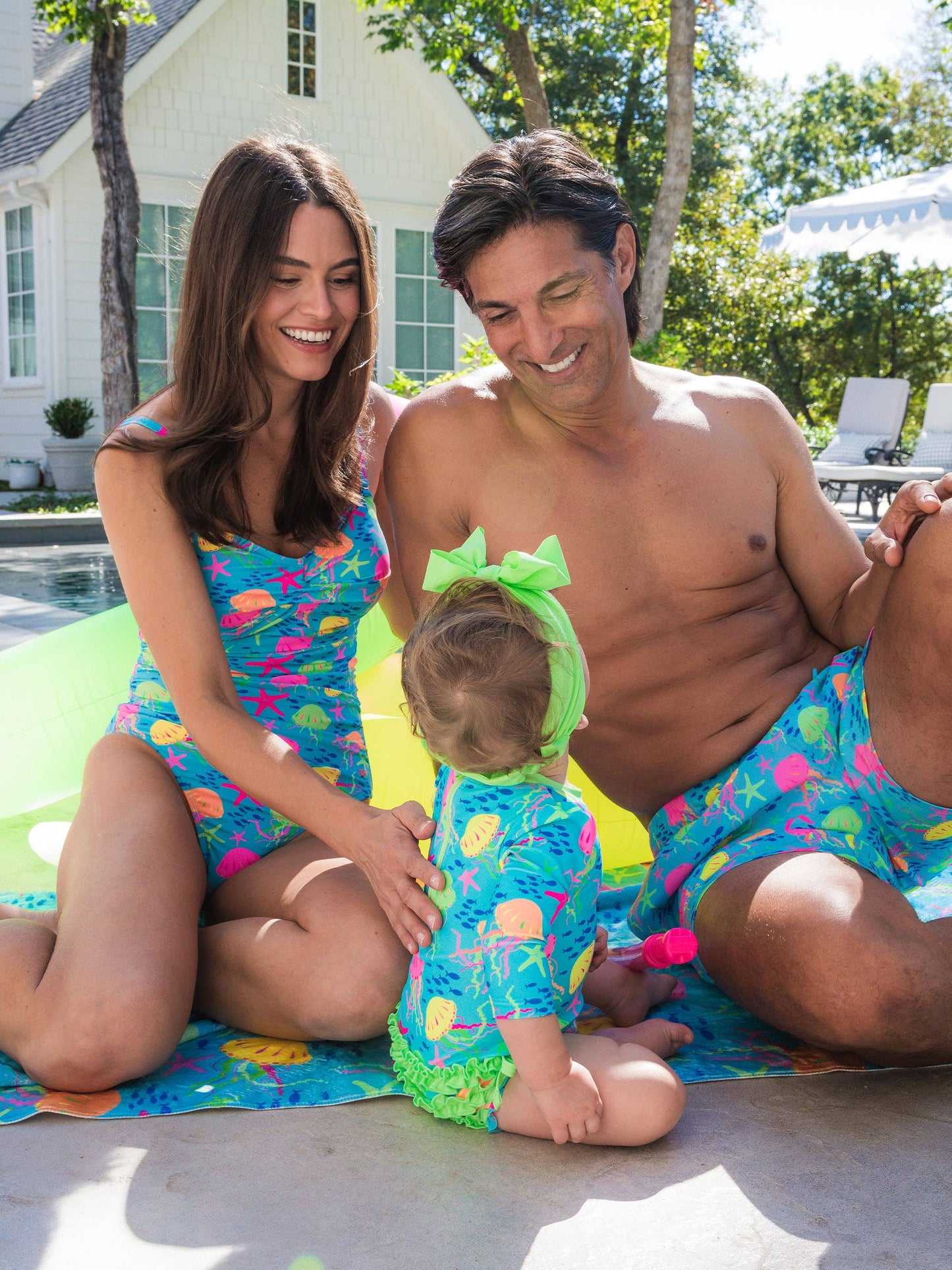 RuffleButts + RuggedButts - Baby Girls Neon Jelly Time Long Sleeve One Piece Rash Guard Swimsuit with Signature Rear Ruffles: Blue