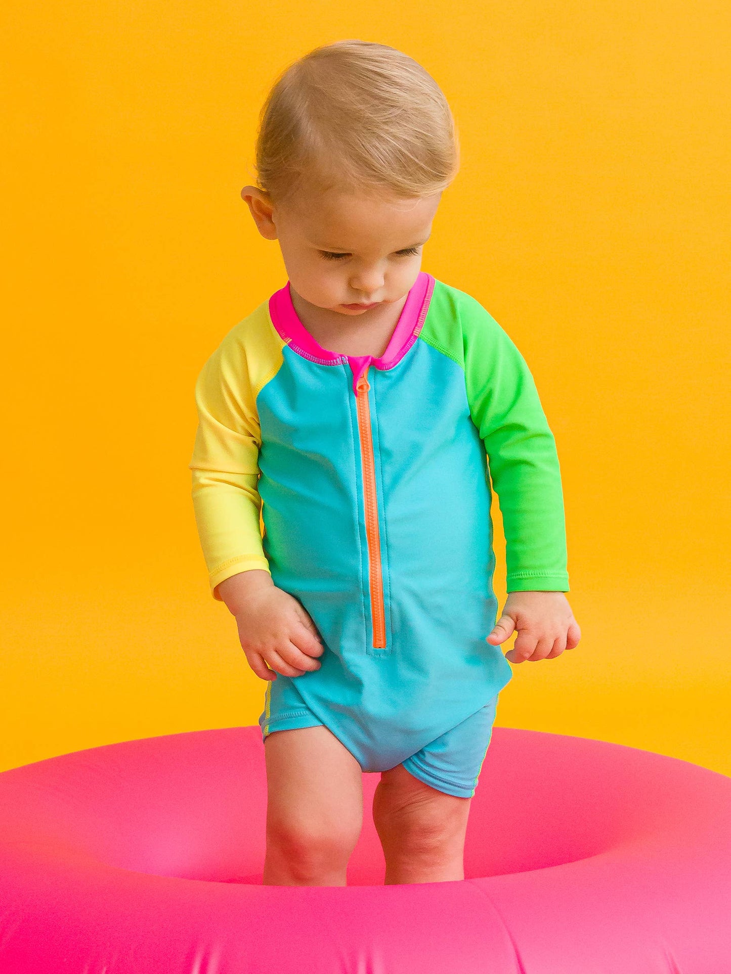 RuffleButts + RuggedButts - Baby Boys Neon Color Block Long Sleeve One Piece Rash Guard Swimsuit