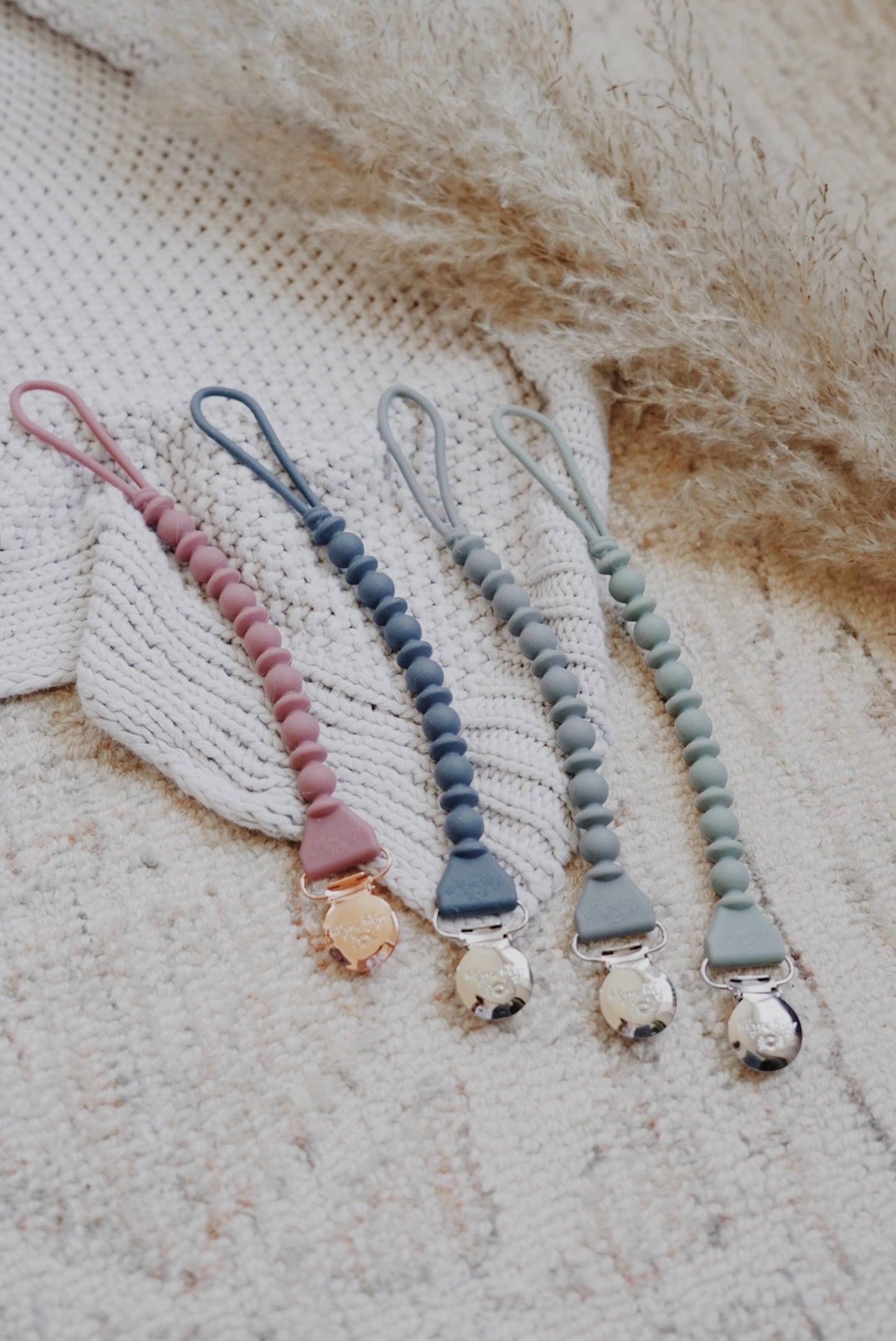 Itzy Ritzy - Sweetie Strap™ Silicone One-Piece Pacifier Clips: Buttercream