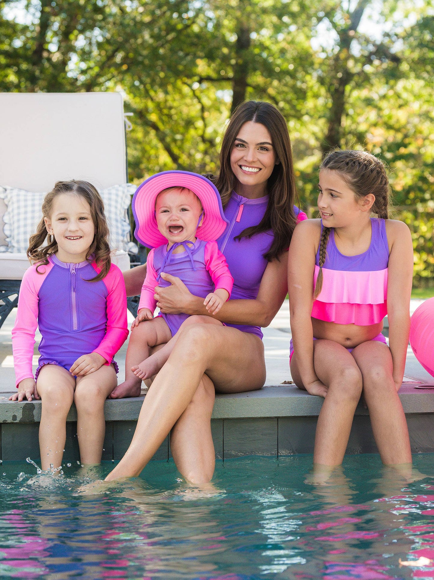 RuffleButts + RuggedButts - Baby Girls Neon Purple Color Block Long Sleeve One Piece Rash Guard Swimsuit with Signature Rear Ruffles: Purple