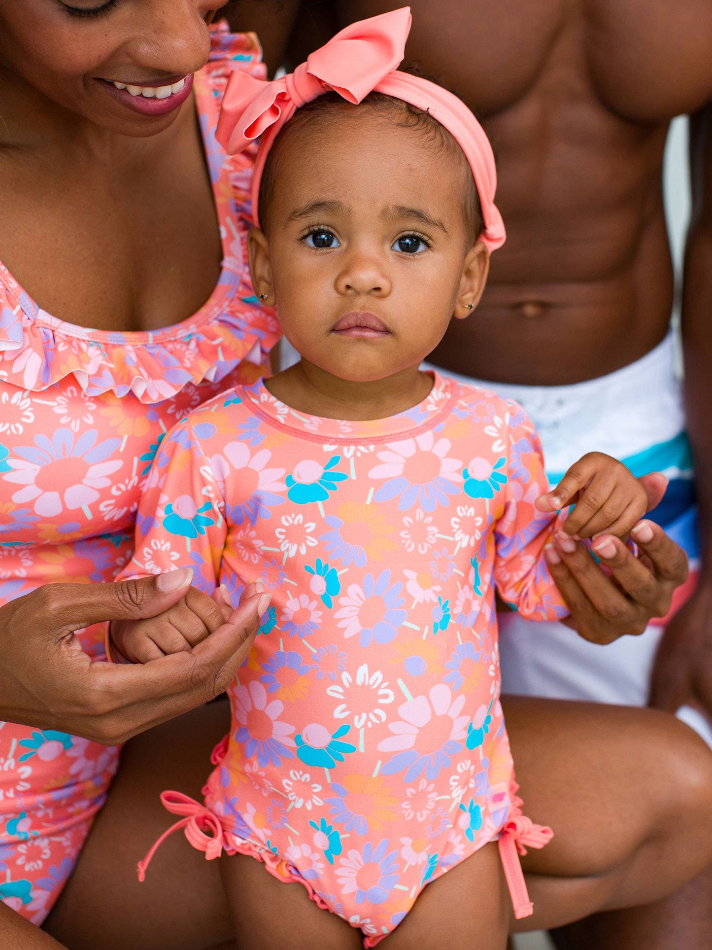 RuffleButts + RuggedButts - Baby Girls Coral Floral Long Sleeve One Piece Rash Guard Swimsuit with Signature Rear Ruffles: Orange