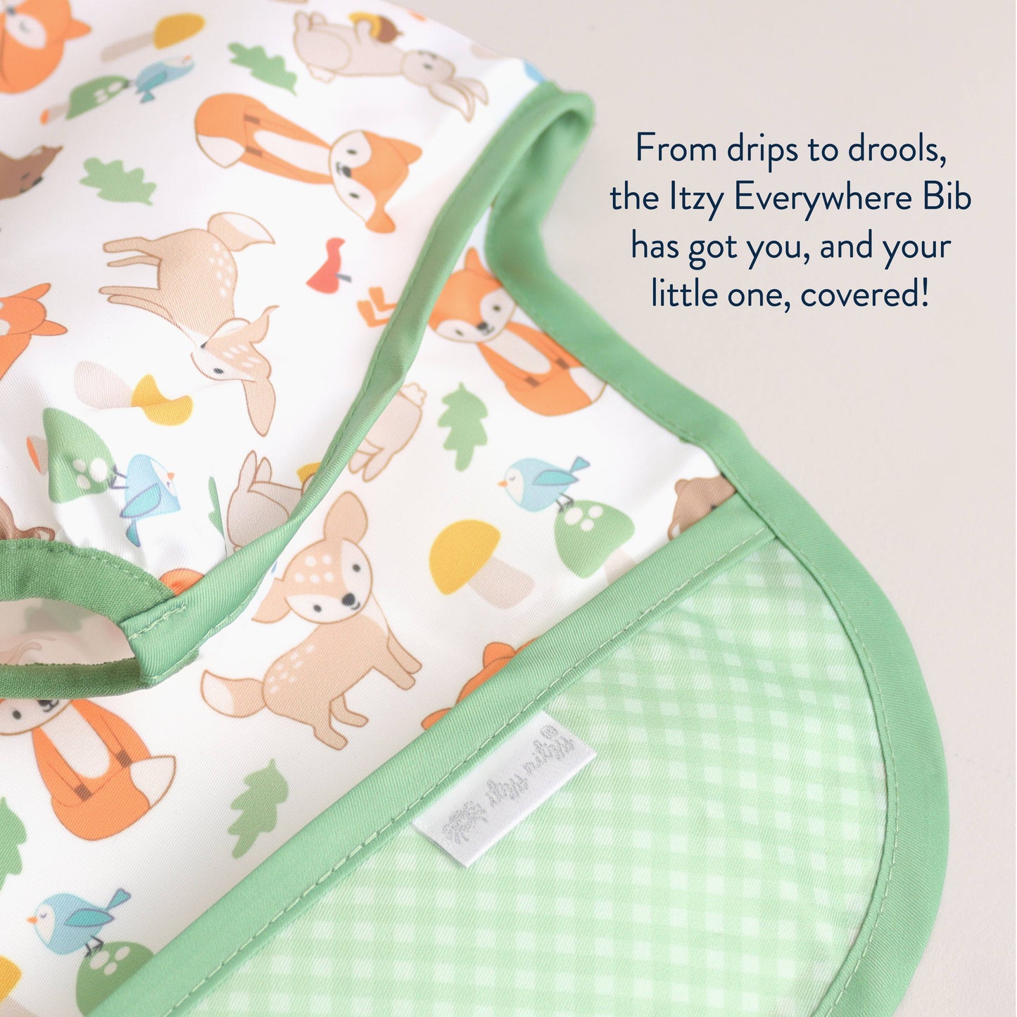 Itzy Ritzy - Itzy Everywhere Bib™ - Long Sleeve Water-resistant Bib: Woodland