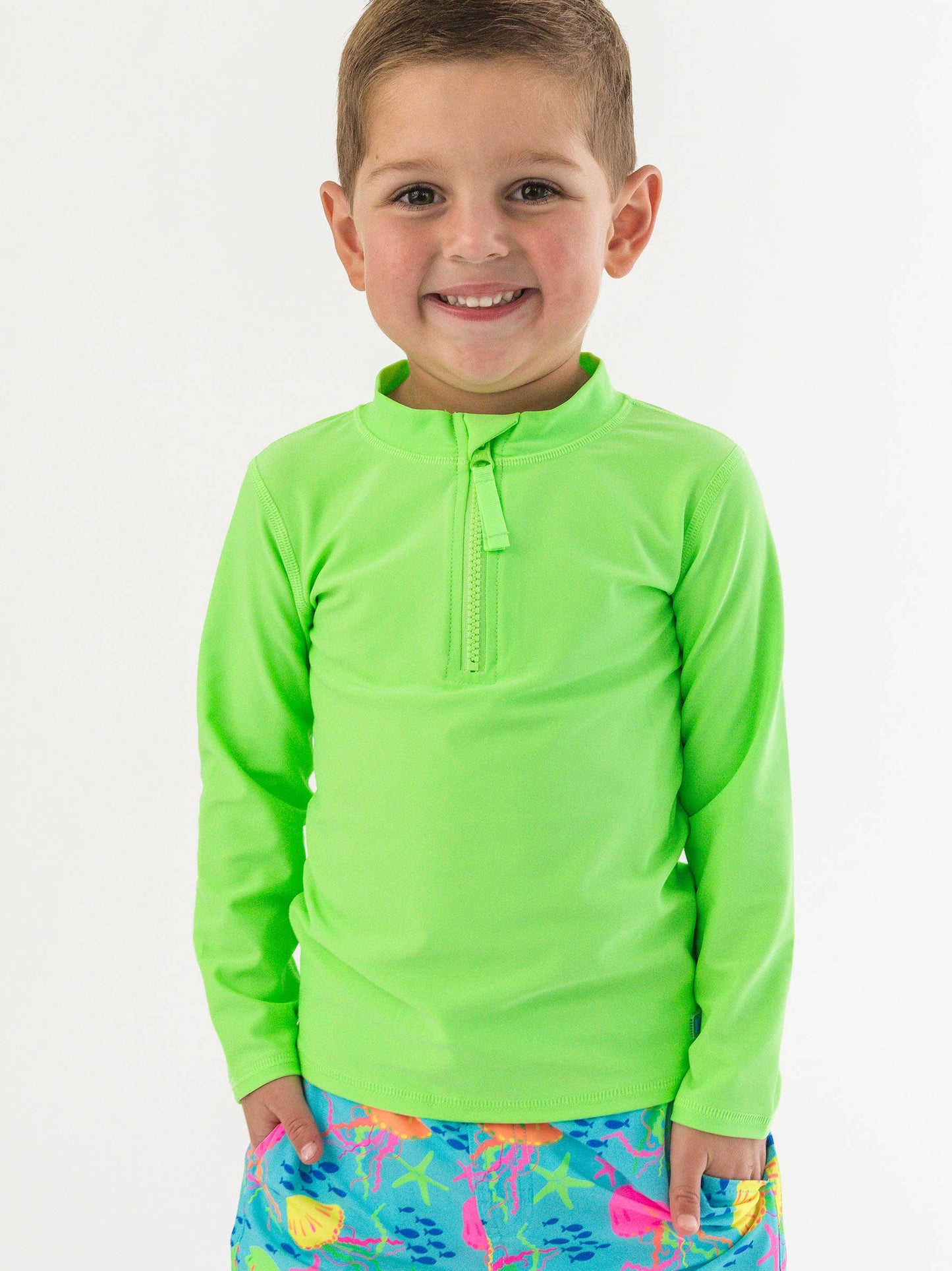 RuffleButts + RuggedButts - Boys Neon Honeydew Long Sleeve Zipper Rash Guard: Green
