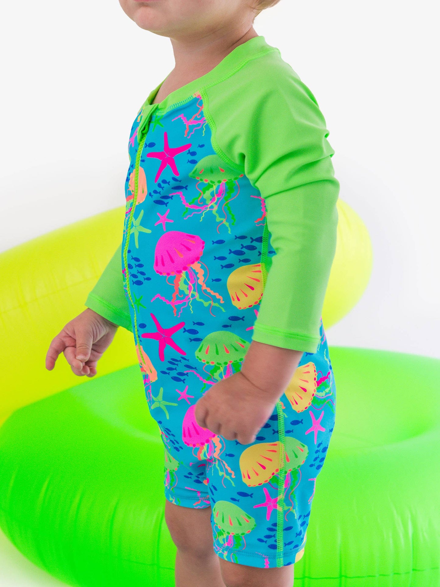 RuffleButts + RuggedButts - Baby Boys Neon Jelly Time Long Sleeve One Piece Rash Guard Swimsuit: Blue