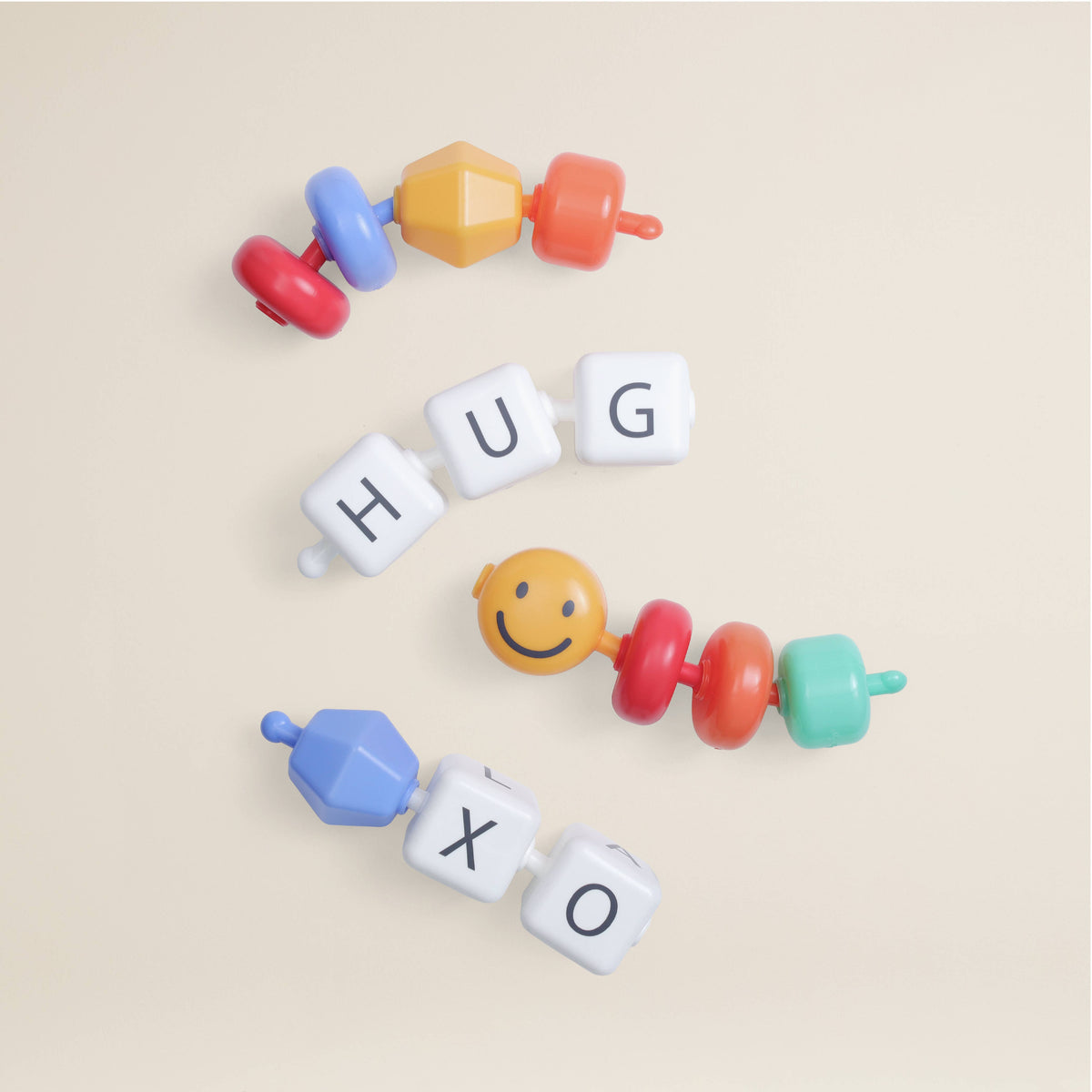 Itzy Ritzy - Connect & Play™ - 14 Sensory Pop Beads - Smile