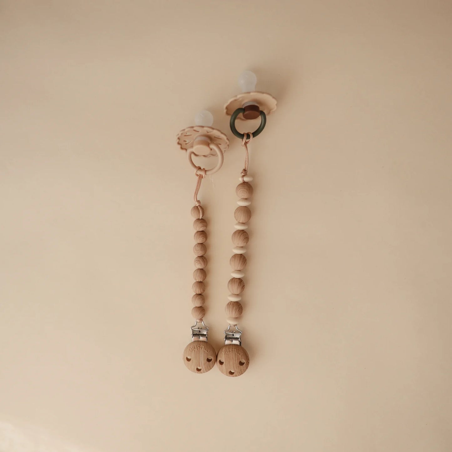 Mushie - Silicone Pacifier Clip | Hera in Faux Wood